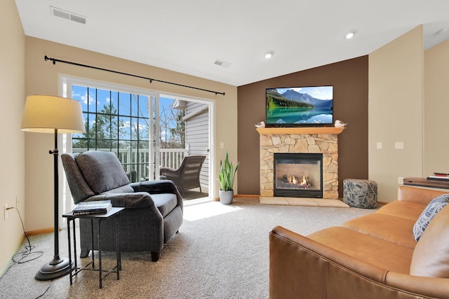living room featuring visible vents, vaulted ceiling, carpet, and baseboards