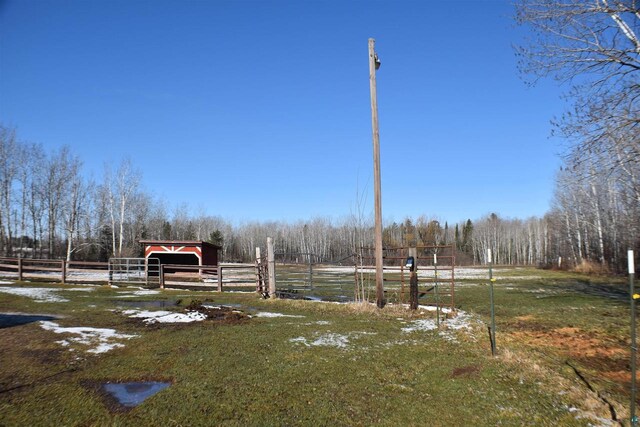 71435 Range Line Rd, Iron River, WI 54847 - view of yard with an exterior structure, fence, and an outbuilding