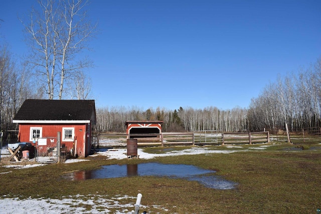 71435 Range Line Rd, Iron River, WI 54847 - view of yard featuring fence and an outbuilding
