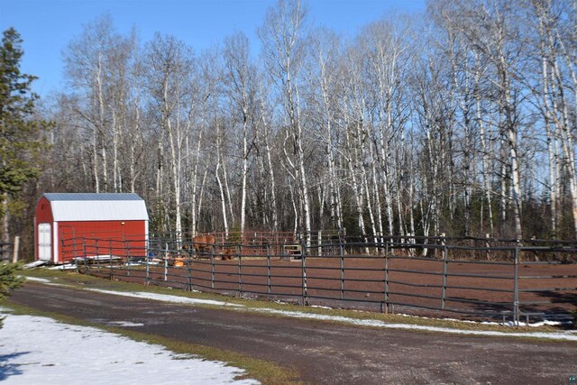 71435 Range Line Rd, Iron River, WI 54847 - view of yard featuring an outdoor structure and fence