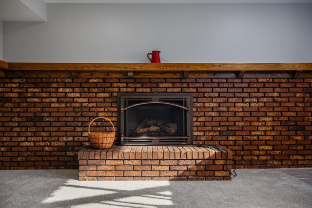 2941 Chapel Ln, Mount Pleasant, WI 53406 - interior details featuring a brick fireplace and carpet
