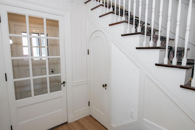 328 Wilson St, Winona, MN 55987 - stairs featuring wood finished floors