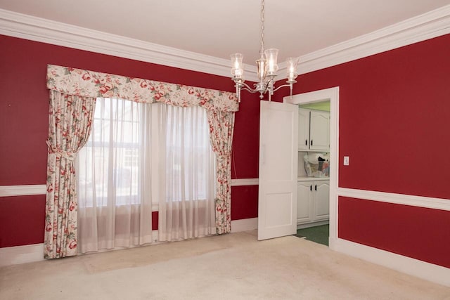 328 Wilson St, Winona, MN 55987 - unfurnished dining area featuring baseboards, carpet, a chandelier, and crown molding