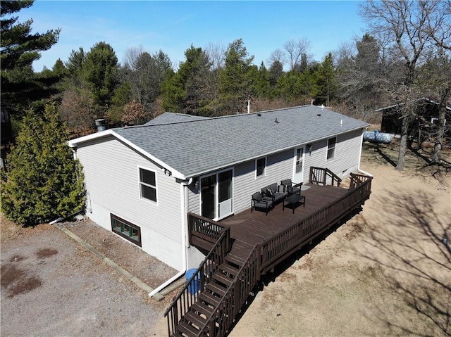 12188 Old Trl, Wisconsin Rapids, WI 54494 - back of property featuring outdoor lounge area, a wooden deck, a shingled roof, and stairway