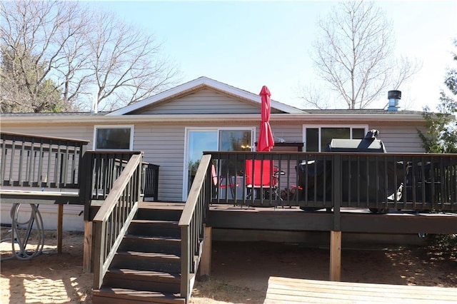 12188 Old Trl, Wisconsin Rapids, WI 54494 - rear view of property with a wooden deck and stairway
