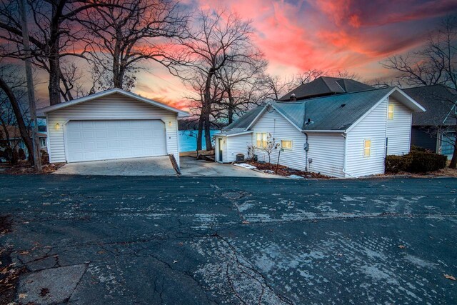 N4142 Sleepy Hollow Rd, Cambridge, WI 53523 - single story home with an outbuilding and a detached garage