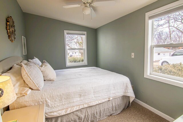 N4142 Sleepy Hollow Rd, Cambridge, WI 53523 - carpeted bedroom featuring vaulted ceiling, a ceiling fan, and baseboards