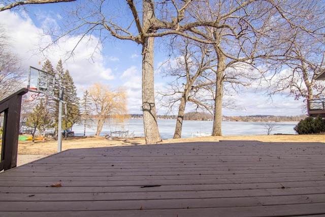 N4142 Sleepy Hollow Rd, Cambridge, WI 53523 - wooden deck with community basketball court and a water view