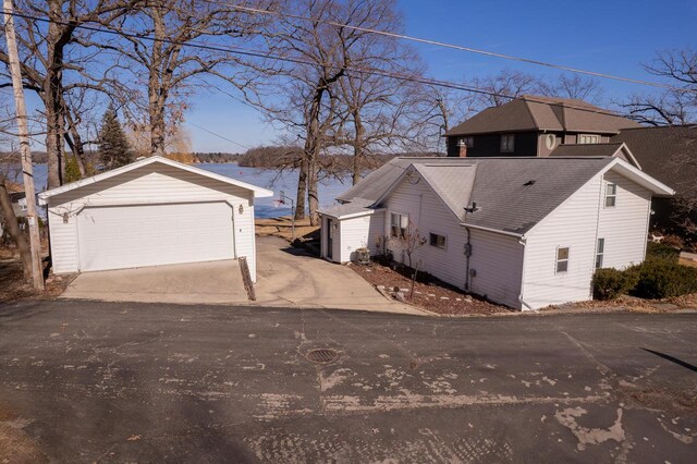 N4142 Sleepy Hollow Rd, Cambridge, WI 53523 - exterior space with an outbuilding and a garage