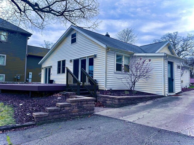 N4142 Sleepy Hollow Rd, Cambridge, WI 53523 - view of front facade featuring a deck