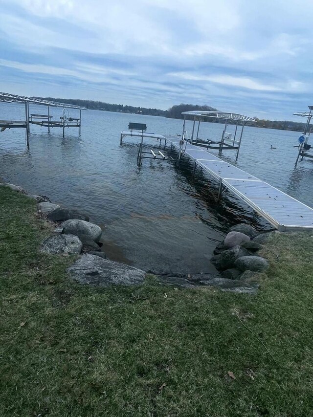 N4142 Sleepy Hollow Rd, Cambridge, WI 53523 - dock area with boat lift and a water view