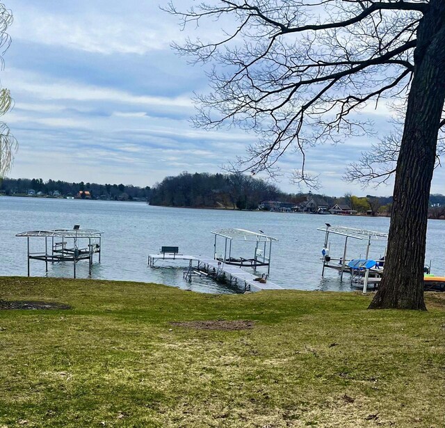 N4142 Sleepy Hollow Rd, Cambridge, WI 53523 - dock area featuring a water view and boat lift