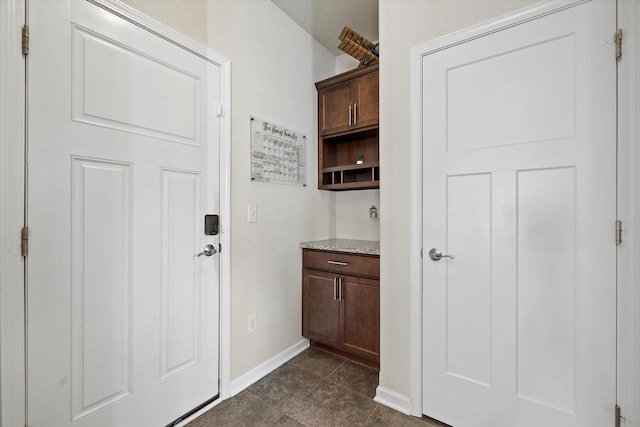 1549 Cambridge Ct, Hubertus, WI 53033 - interior space featuring baseboards and dark tile patterned floors