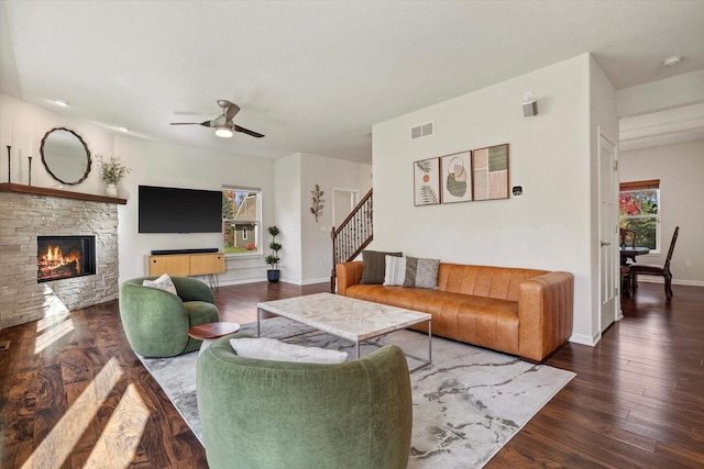 1549 Cambridge Ct, Hubertus, WI 53033 - living room with a ceiling fan, wood finished floors, visible vents, and a fireplace