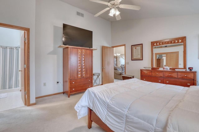 864 Chief Kewaskum Pl, Kewaskum, WI 53040 - carpeted bedroom with lofted ceiling, baseboards, a ceiling fan, and visible vents