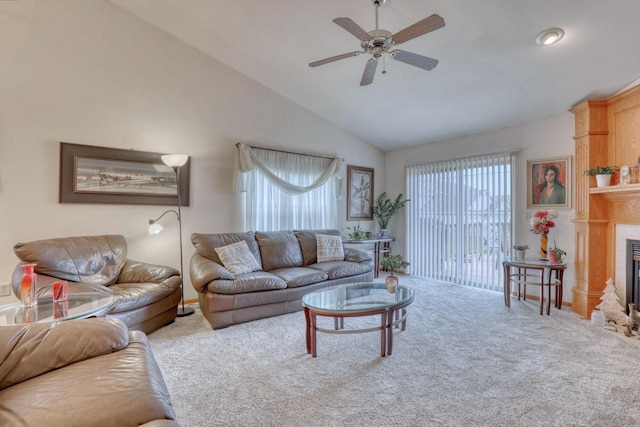 864 Chief Kewaskum Pl, Kewaskum, WI 53040 - living room with a glass covered fireplace, carpet floors, ceiling fan, and high vaulted ceiling