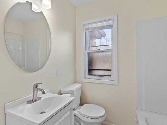7509 W Burleigh St, Milwaukee, WI 53210 - full bathroom with walk in shower, toilet, vanity, and a bathing tub