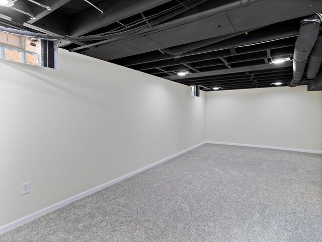 7509 W Burleigh St, Milwaukee, WI 53210 - basement featuring carpet floors and baseboards