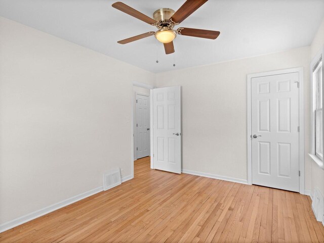 7509 W Burleigh St, Milwaukee, WI 53210 - unfurnished bedroom featuring visible vents, baseboards, and light wood-style floors