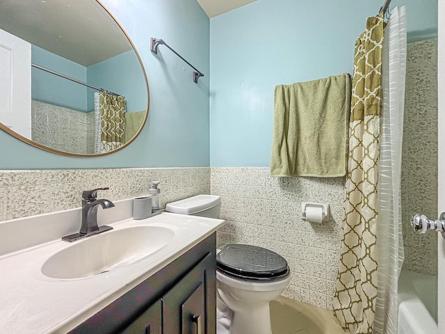 825 Post Rd, Brookfield, WI 53005 - full bath featuring toilet, vanity, a wainscoted wall, and tile walls