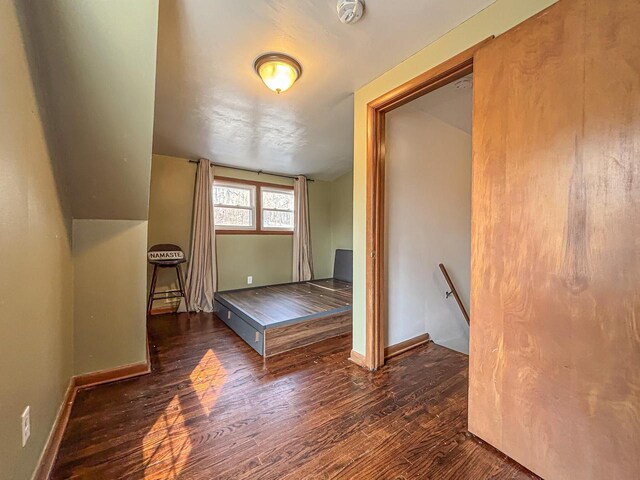 825 Post Rd, Brookfield, WI 53005 - unfurnished bedroom with baseboards and wood finished floors