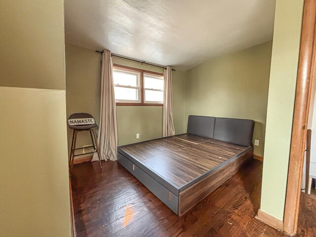 825 Post Rd, Brookfield, WI 53005 - bedroom featuring baseboards and wood finished floors