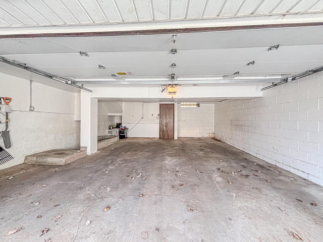 825 Post Rd, Brookfield, WI 53005 - garage featuring a garage door opener