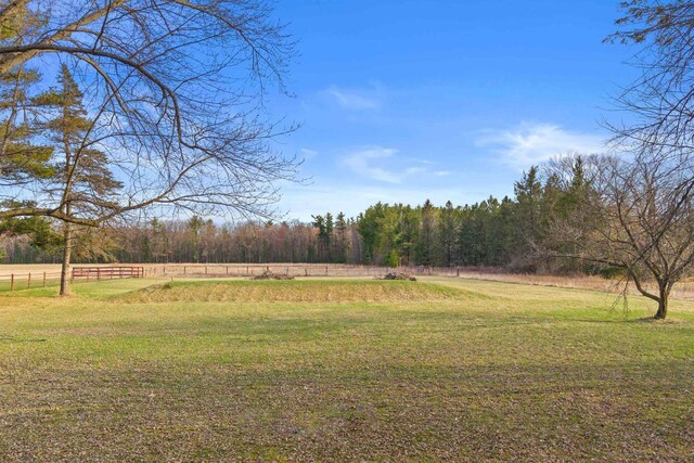 771 Seneca Rd, Wisconsin Rapids, WI 54495 - view of yard with a rural view, a view of trees, and fence