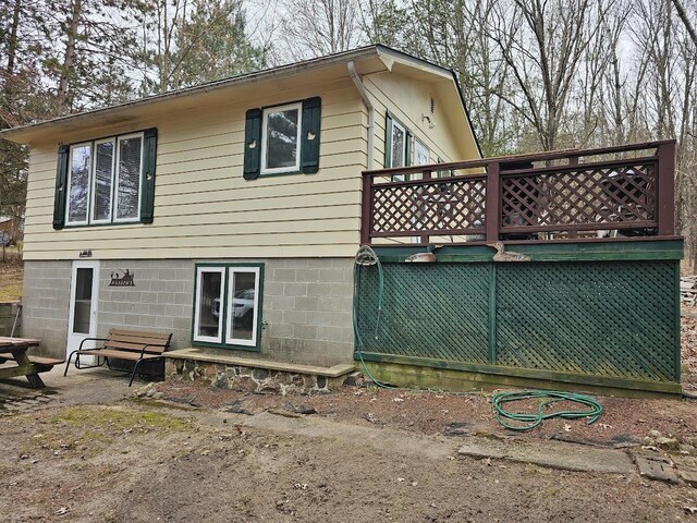 W5691 Cedar Trl, Neshkoro, WI 54960 - rear view of property with a deck