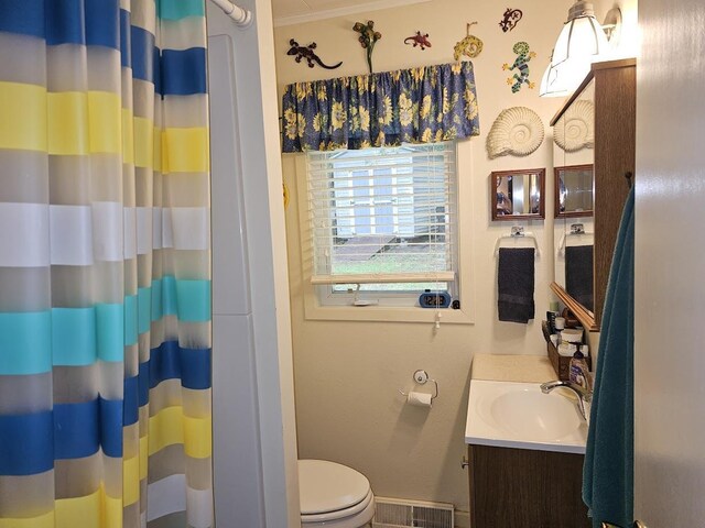 W5691 Cedar Trl, Neshkoro, WI 54960 - bathroom featuring toilet, visible vents, curtained shower, crown molding, and vanity