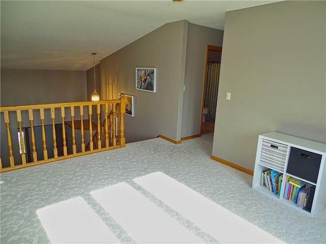 N1698 945th St, Eau Claire, WI 54701 - interior space featuring vaulted ceiling, baseboards, and carpet floors