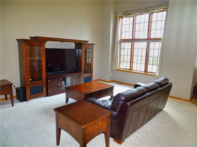 N1698 945th St, Eau Claire, WI 54701 - carpeted living room with plenty of natural light and baseboards