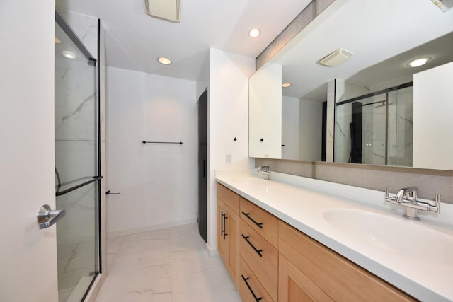 2027 N Commerce St Unit 2027, Milwaukee, WI 53212 - full bathroom with marble finish flooring, a marble finish shower, double vanity, and recessed lighting