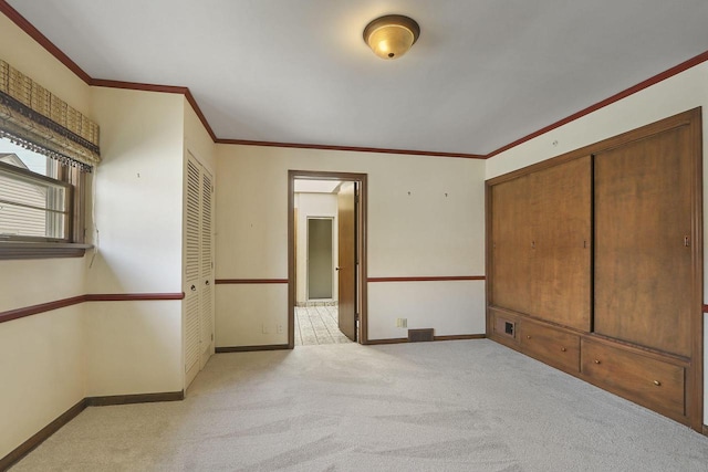 7709 3rd Ave, Kenosha, WI 53143 - interior space with light carpet, baseboards, and ornamental molding