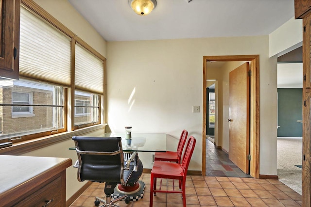 7709 3rd Ave, Kenosha, WI 53143 - dining space with baseboards and light tile patterned floors