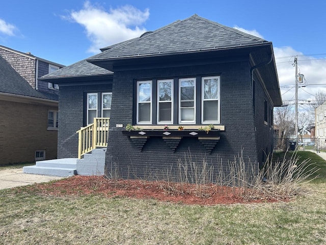 4271 N 26th St, Milwaukee, WI 53209 - bungalow-style home featuring brick siding and a shingled roof