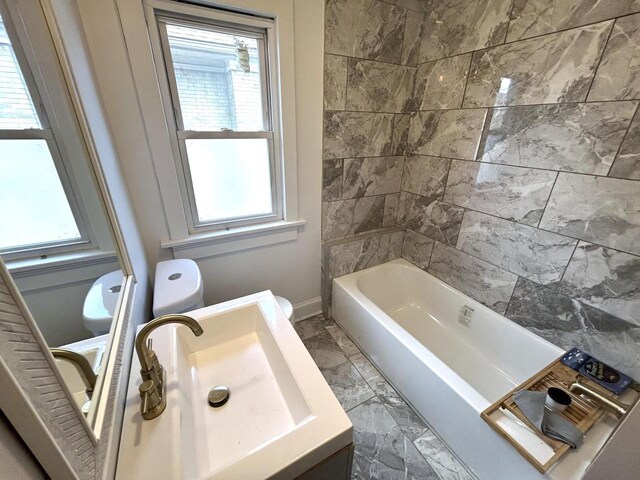 4271 N 26th St, Milwaukee, WI 53209 - bathroom with vanity, baseboards, marble finish floor, and toilet