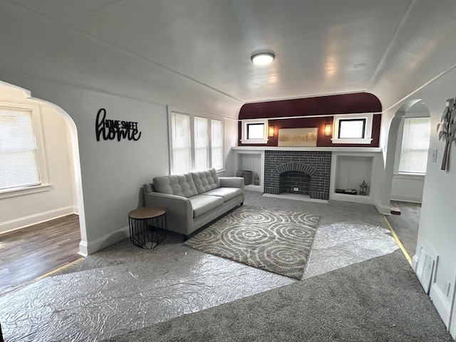 4271 N 26th St, Milwaukee, WI 53209 - living area featuring arched walkways, visible vents, and a wealth of natural light