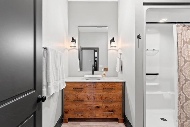 6916 N Palladium Ct, Appleton, WI 54913 - full bath with a shower with curtain, vanity, and wood finished floors