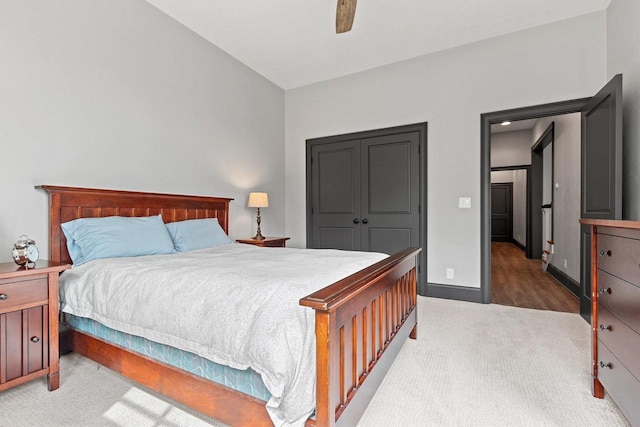 6916 N Palladium Ct, Appleton, WI 54913 - bedroom with light colored carpet, baseboards, a closet, and a ceiling fan