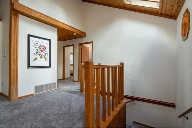 840 Park Dr, Balsam Lake, WI 54810 - stairs with carpet, wooden ceiling, baseboards, lofted ceiling, and visible vents