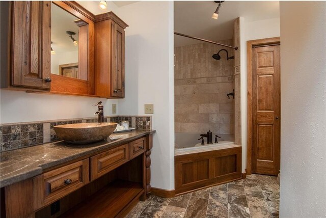 840 Park Dr, Balsam Lake, WI 54810 - bathroom with backsplash and vanity