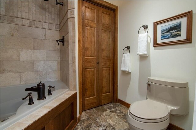 840 Park Dr, Balsam Lake, WI 54810 - full bathroom with a bath, walk in shower, toilet, and baseboards