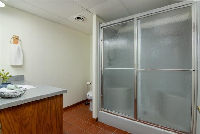 840 Park Dr, Balsam Lake, WI 54810 - full bathroom featuring tile patterned floors, toilet, visible vents, a shower with door, and vanity