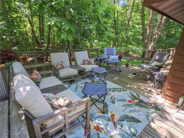 840 Park Dr, Balsam Lake, WI 54810 - wooden terrace featuring an outdoor living space