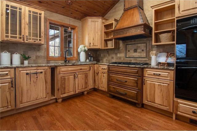 840 Park Dr, Balsam Lake, WI 54810 - kitchen featuring premium range hood, open shelves, a sink, and black appliances