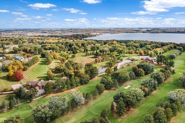 bird's eye view with view of golf course and a water view