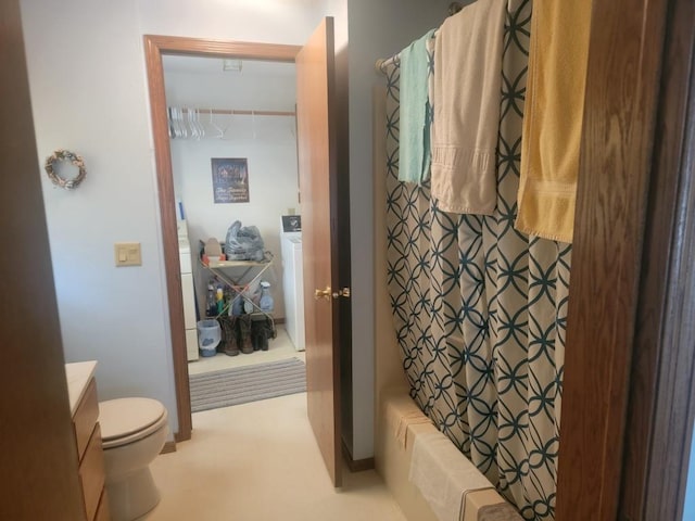 S5026 Greenfield Ln, Baraboo, WI 53913 - bathroom featuring toilet, vanity, and shower / bath combo with shower curtain