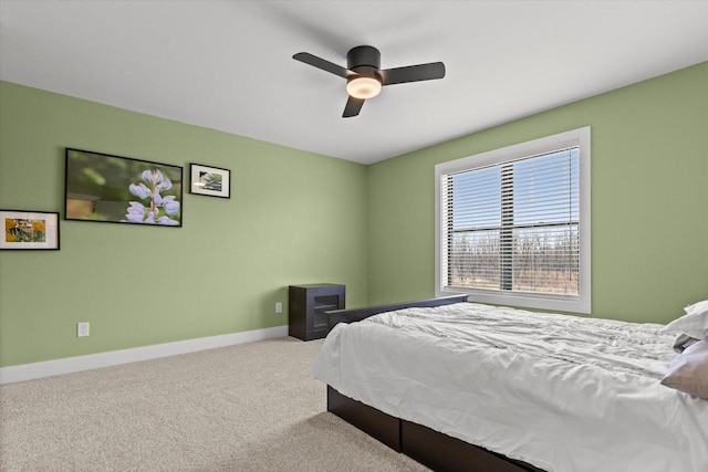 bedroom with carpet floors, baseboards, and ceiling fan