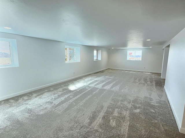 basement with carpet and baseboards